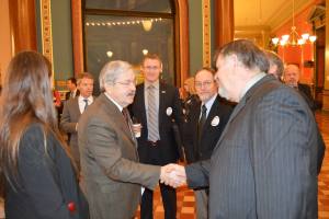 Branstad speaks with a group of Northwest Iowa farmers following the event