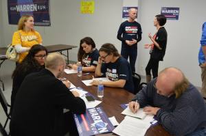 Warren supporters hit the phones at the end of the meeting