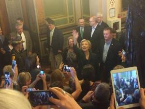 Reader-submitted photo of Clinton waving to Capitol crowd