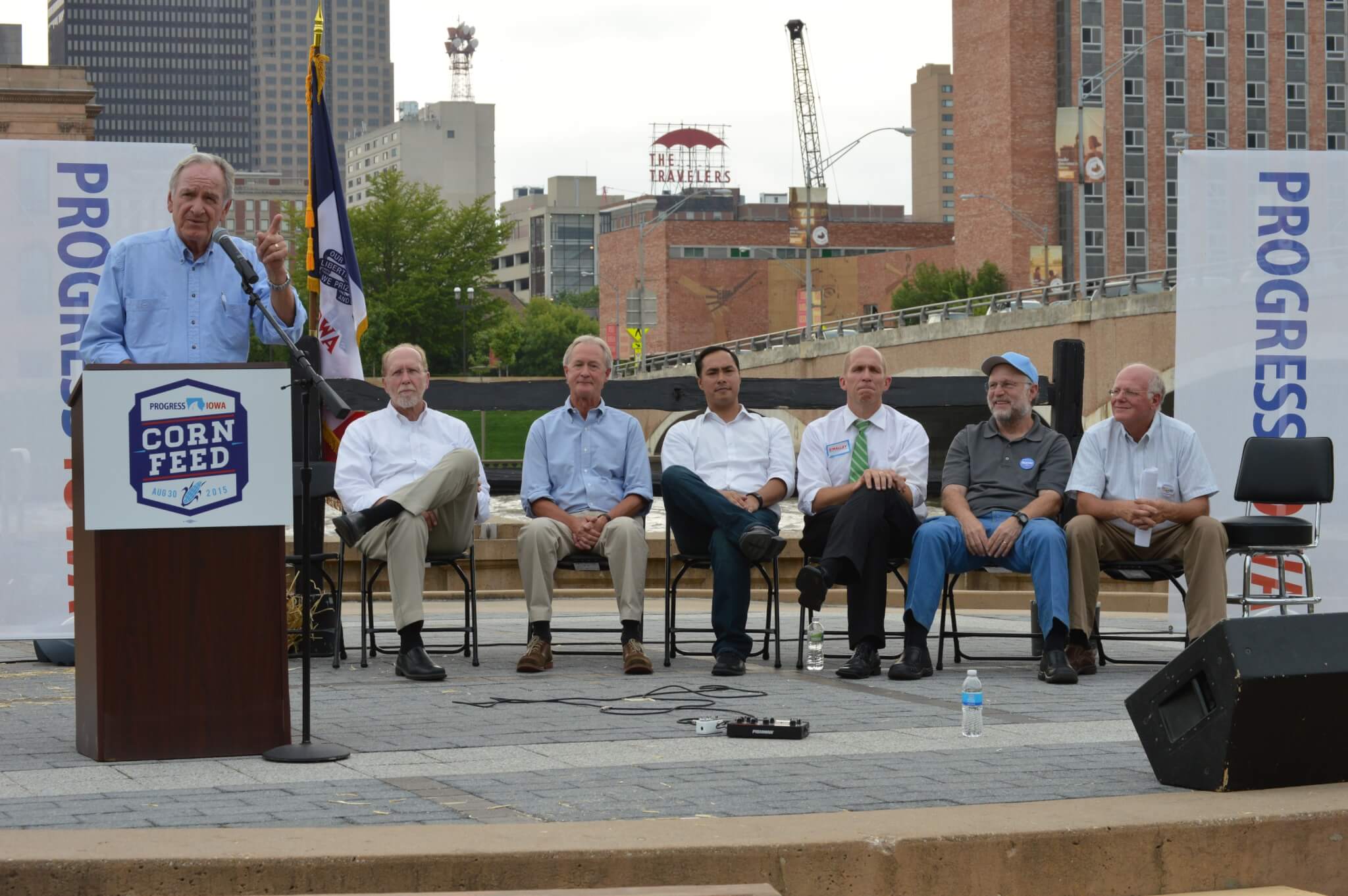 Harkin speaks with Chafee, Loebsack, Castro, Hucker and Ben and Jerry in the background