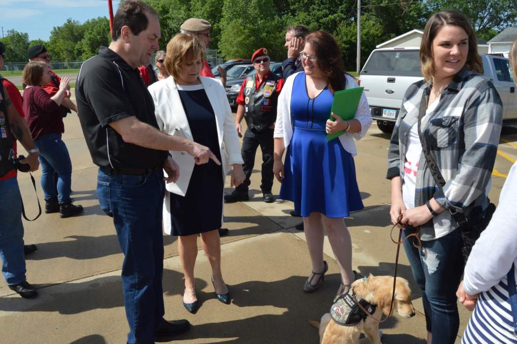 Vernon and Kressig meet a service dog in training