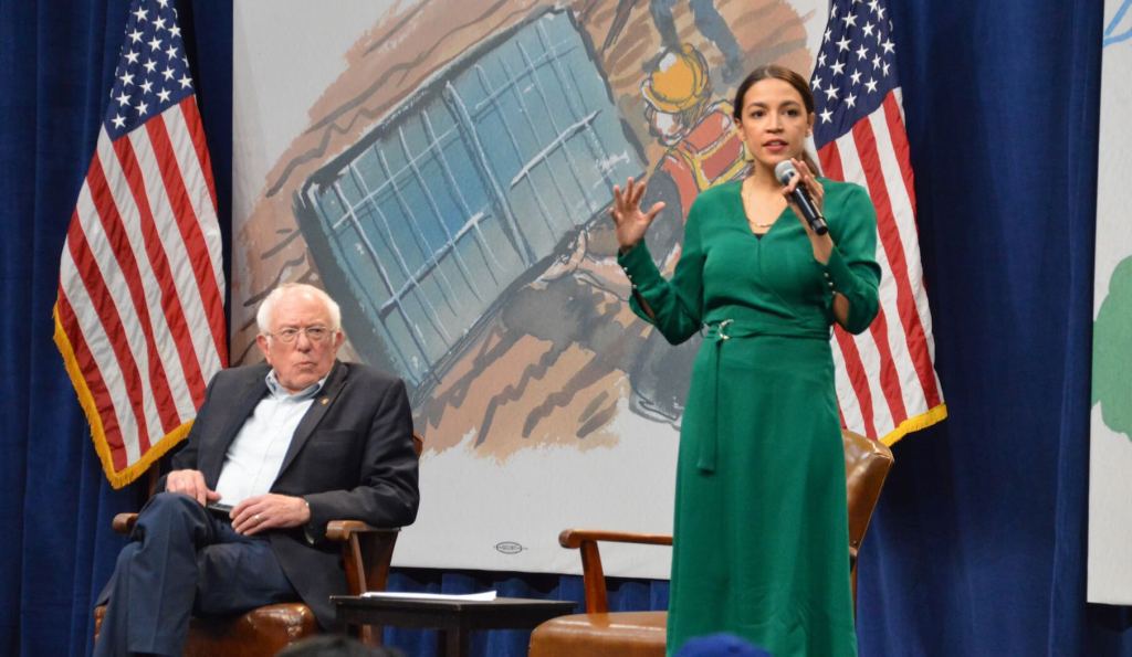 AOC Boosts Sanders’ Claim To ‘Climate Candidate’ Title In Iowa