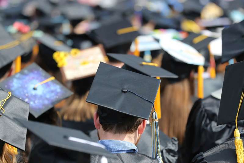 In this May 5, 2018, file photo, graduates at the University of Toledo commencement ceremony in Toledo, Ohio. (AP Photo/Carlos Osorio, File)