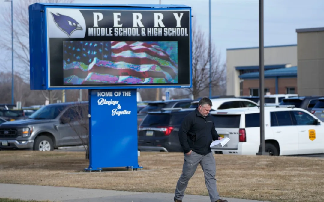 Perry principal stable after being shot while protecting students