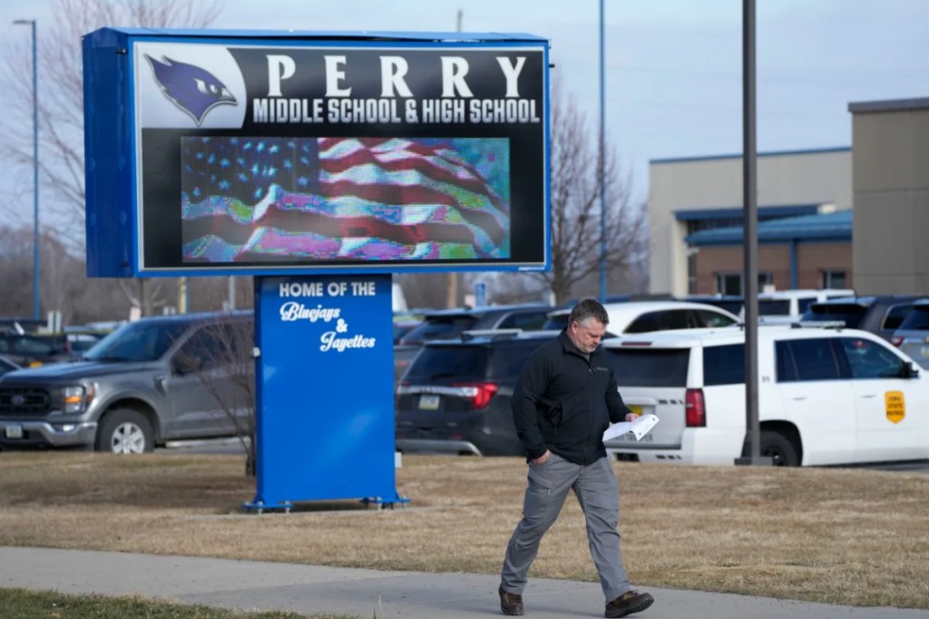 Perry principal stable after being shot while protecting students