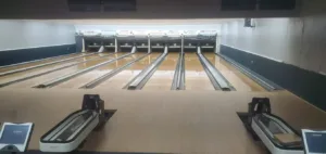 A clean and freshly remodeled bowling alley.