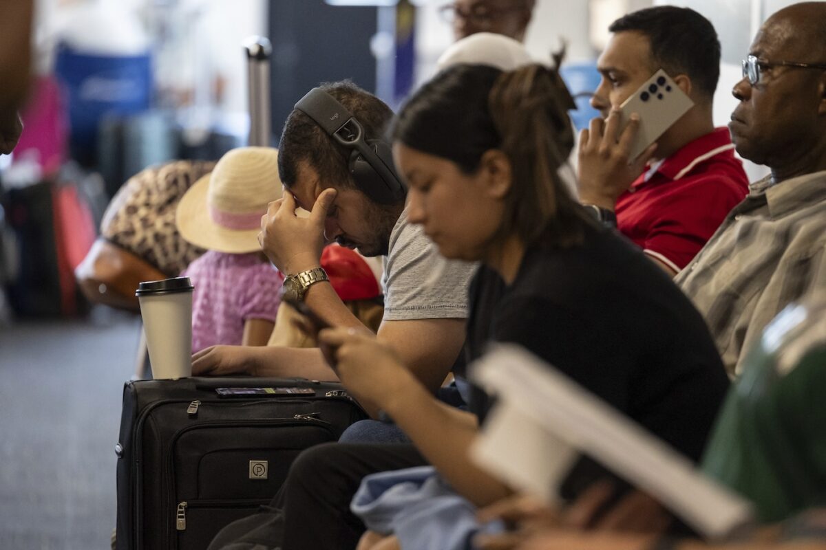 Your flight was canceled by the technology outage. What do you do next?