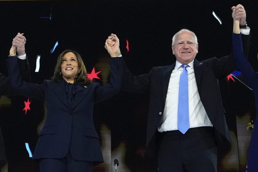 Democratic presidential nominee Vice President Kamala Harris and Democratic vice presidential candidate Minnesota Gov. Tim Walz appear at the 2024 Democratic National Convention, Aug. 22, 2024 in Chicago. (AP Photo/Paul Sancya)