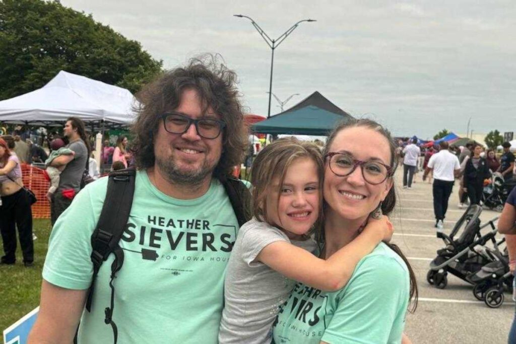 Heather Sievers with her husband and daughter, out at an event.