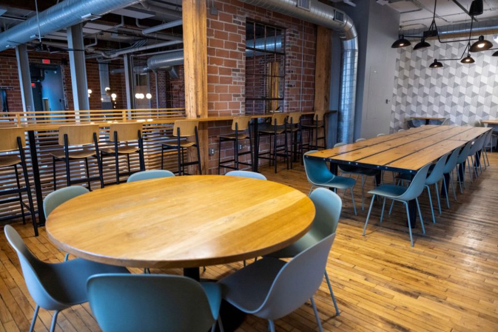 The mezzanine of the gaming lounge, showing more tables in an elevated space 