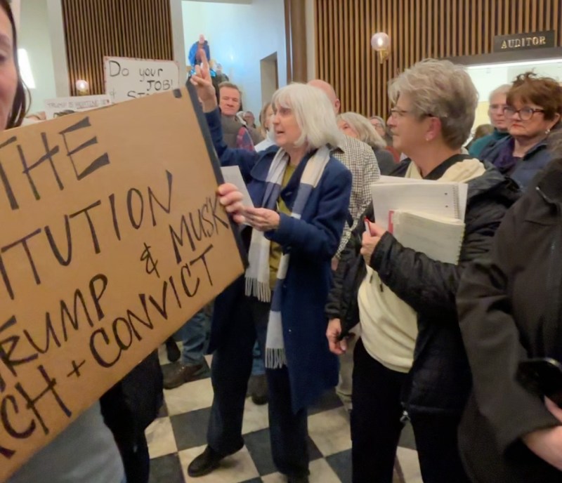 An overflow crowd fills the first floor of the Franklin County Courthouse in Hampton, Iowa, on Friday, March 21, 2025. (Amie Rivers/Iowa Starting Line)