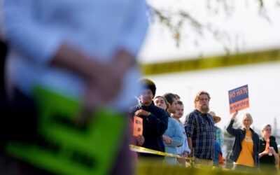 Hundreds gather for ‘protective accompaniment’ event outside Cedar Rapids ICE office