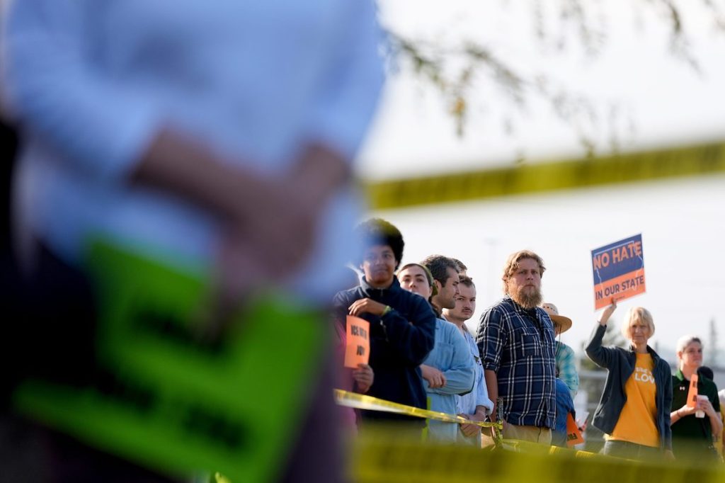 Hundreds gather for ‘protective accompaniment’ event outside Cedar Rapids ICE office