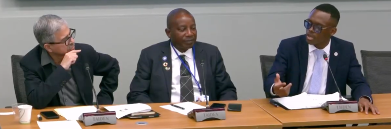 Screenshot of a video from the 2026 World Bank-IMF Annual Meetings in April 2026. Luther College junior Mansur Kasali (right) speaks at one of those meetings about improving access to technology for small farmers.