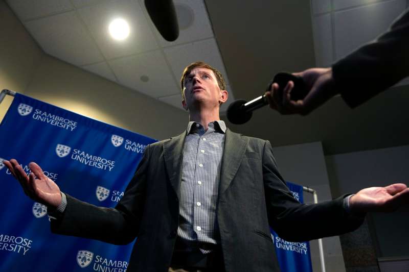Rob Sand speaks with the media after his Oct. 6 debate for Iowa governor
