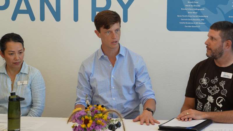 Rob Sand speaks at a Coralville food pantry roundtable about summer EBT